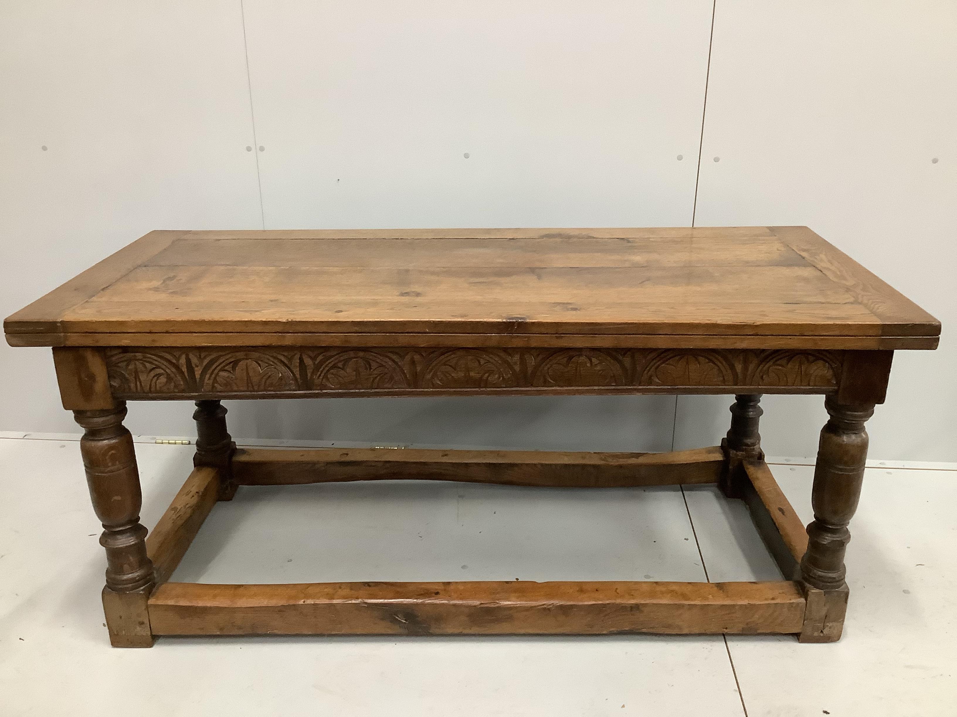 A 17th century style rectangular oak refectory dining table, incorporates old timber, width 168cm, depth 73cm, height 73cm